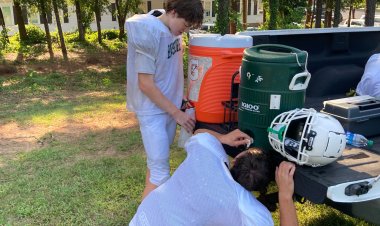 High School Football Coaches and Trainers Navigate Intense Heat Index During Practices