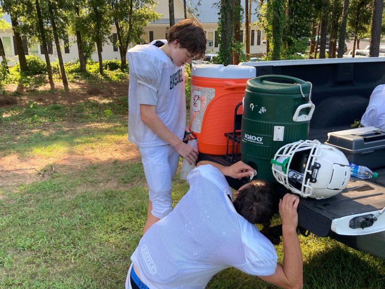 High School Football Coaches and Trainers Navigate Intense Heat Index During Practices