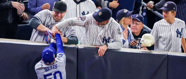 Yankees Fan Snatches Ball from Mookie Betts After Struggling to Remove Glove