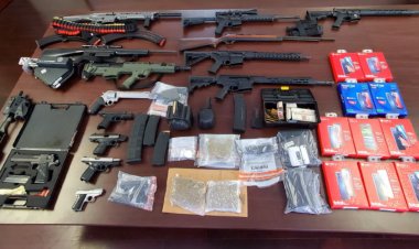 Guns, drugs seized in raid at Ensley home in ongoing prison contraband probe